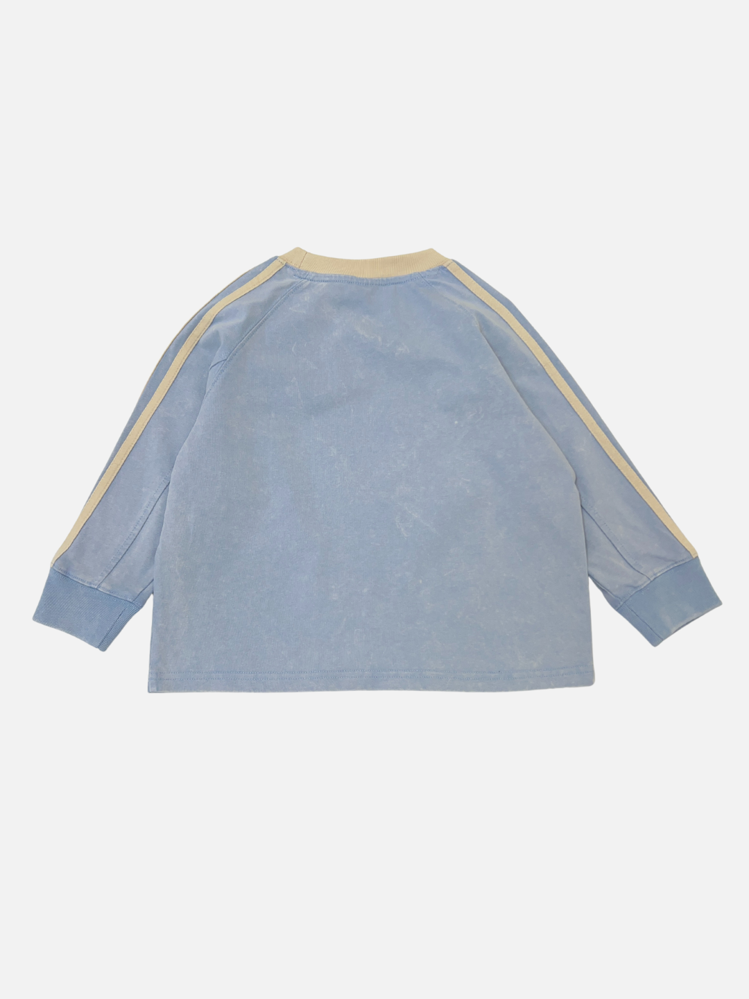 The HALFTIME LONGSLEEVE is a light blue, oversized long-sleeve tee with a beige collar and striped sleeves, shown flat with the back facing up.