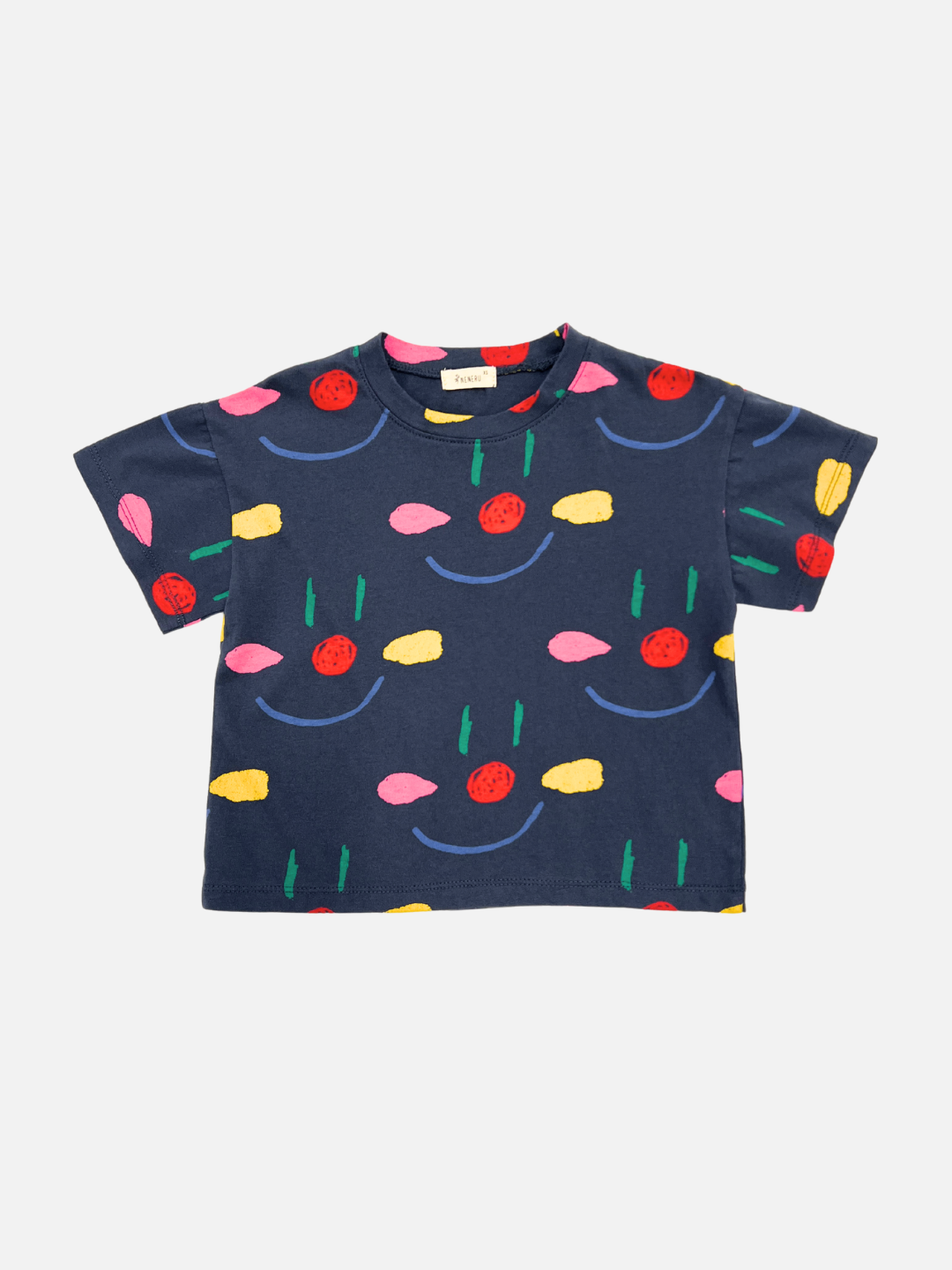 Navy | Front view of the kid's Facepaint tee in Navy covered with an all-over clown like painted faces