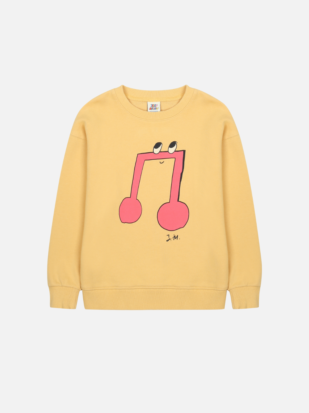 The MELODY SWEATSHIRT is a yellow crewneck with a large pink musical note graphic, complete with eyes and a smile—shop this cheerful style
