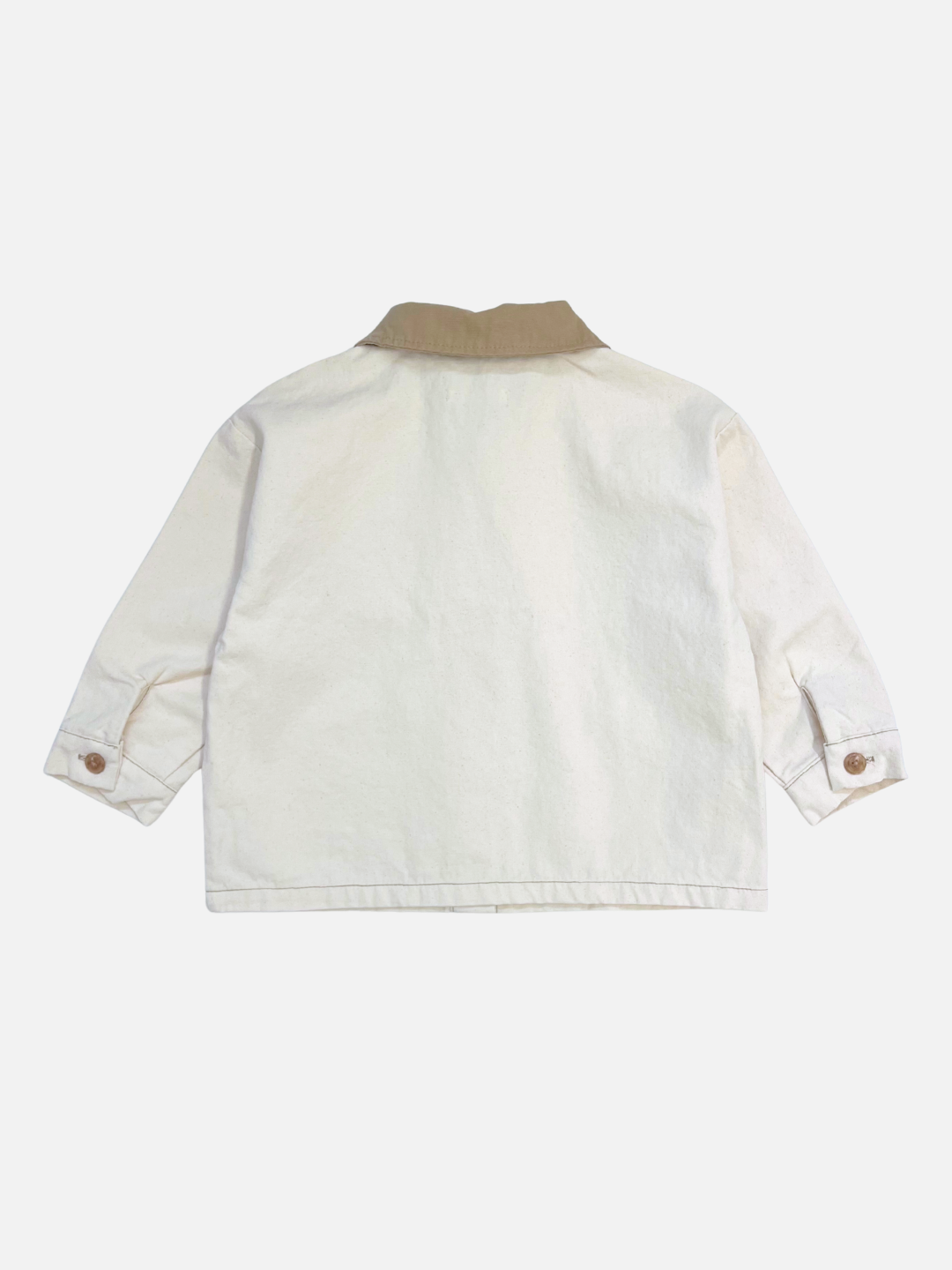 Ecru | Back view of MINI WORKWEAR JACKET for kids: off-white, long sleeves, buttoned cuffs, contrasting light brown collar, shown flat on a white background.