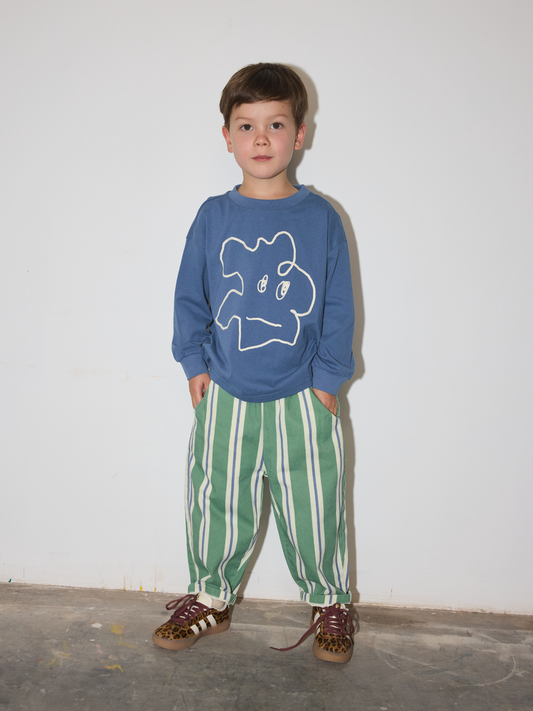 Second image of Green and white vertically striped kids trousers with an elastic waistband, shown flat on a light gray background.