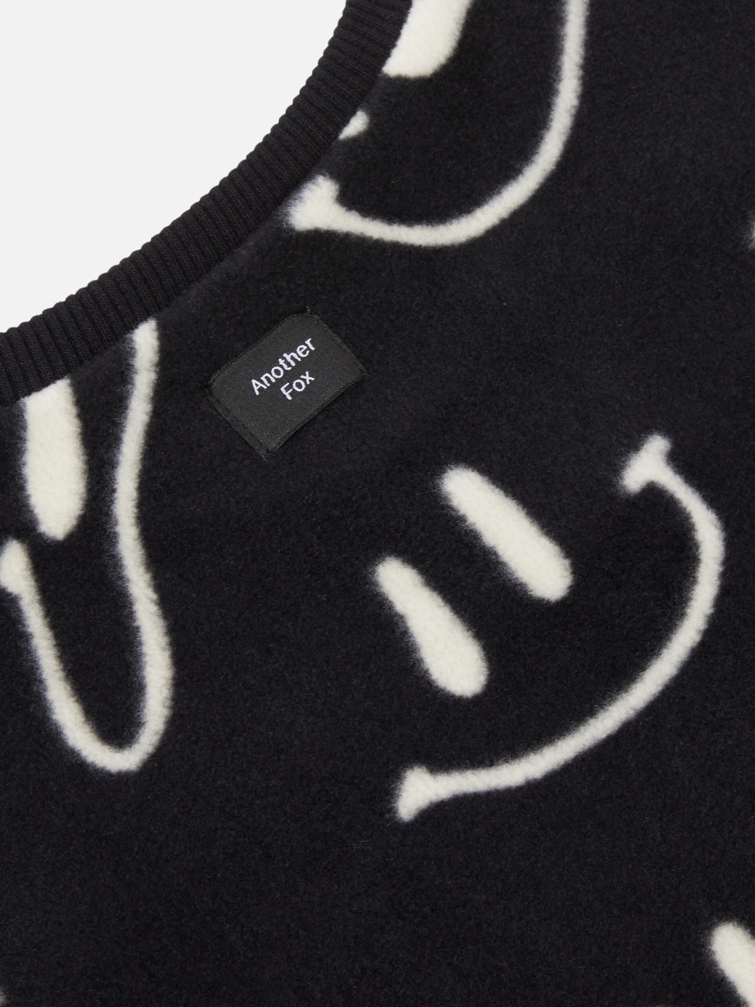 WAVY GRIN FLEECE SWEATSHIRT