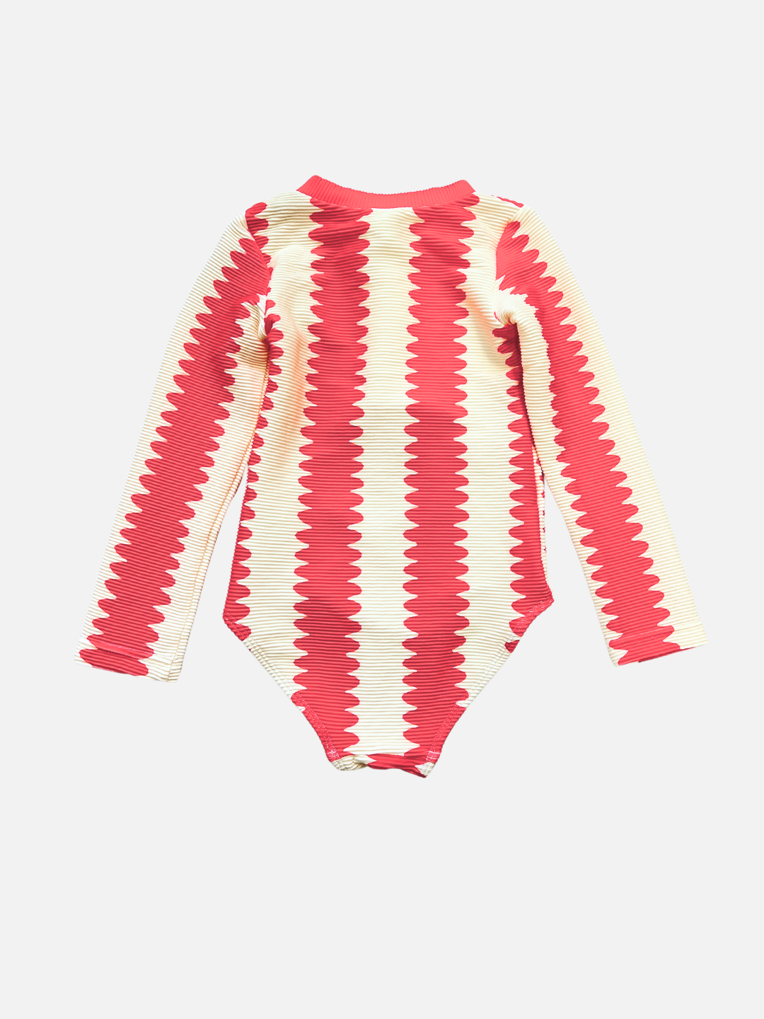 A FULL PIECE SWIMSUIT with red and cream zigzag stripes, made from recycled material, is shown laid flat on a white background.