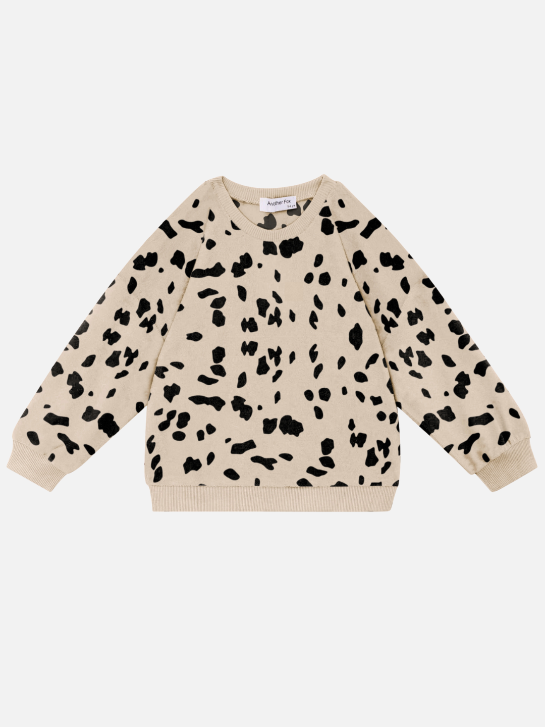 The DALMATIAN TERRY SWEATSHIRT, a beige long-sleeve sweatshirt featuring a black abstract spotted pattern, is perfect for babies and laid flat on a white background. Check out this piece and other new arrivals when you shop all clothing.