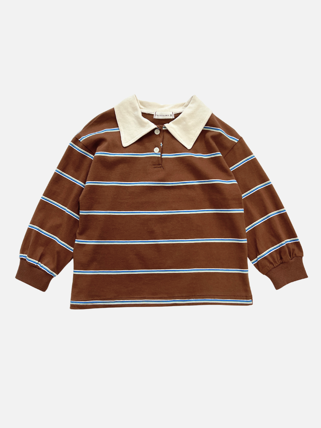 The RETRO RUGBY LONGSLEEVE in brown from a Korean kids brand features blue and white horizontal stripes, a beige rugby collar, and a front button placket. It is shown laid flat on a white background.