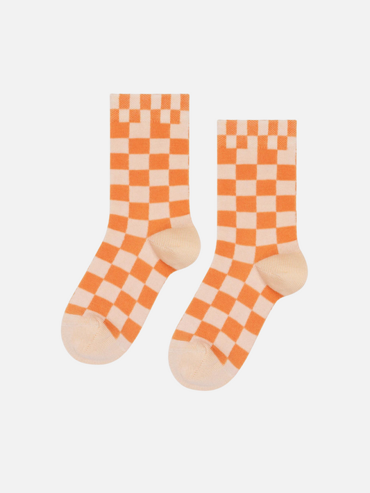 Image of A pair of kids' ankle socks in a peaches and cream check