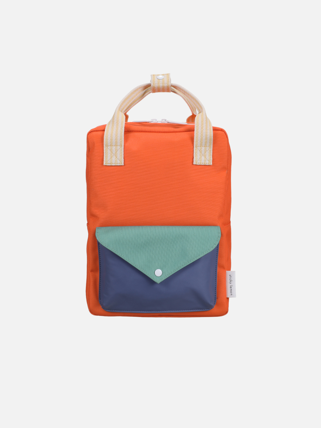 The MEDIUM ENVELOPE BACKPACK in Lifebuoy Orange is medium-sized with beige handles, a green and blue front pocket, waterproof lining, and a white button, displayed against a plain white background.