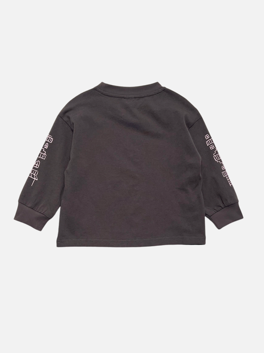 Second image of Charcoal | Charcoal CITY LONGSLEEVE crafted from soft cotton jersey, featuring striking white city block graphics of buildings on the front and both sleeves, shown on a plain white background.