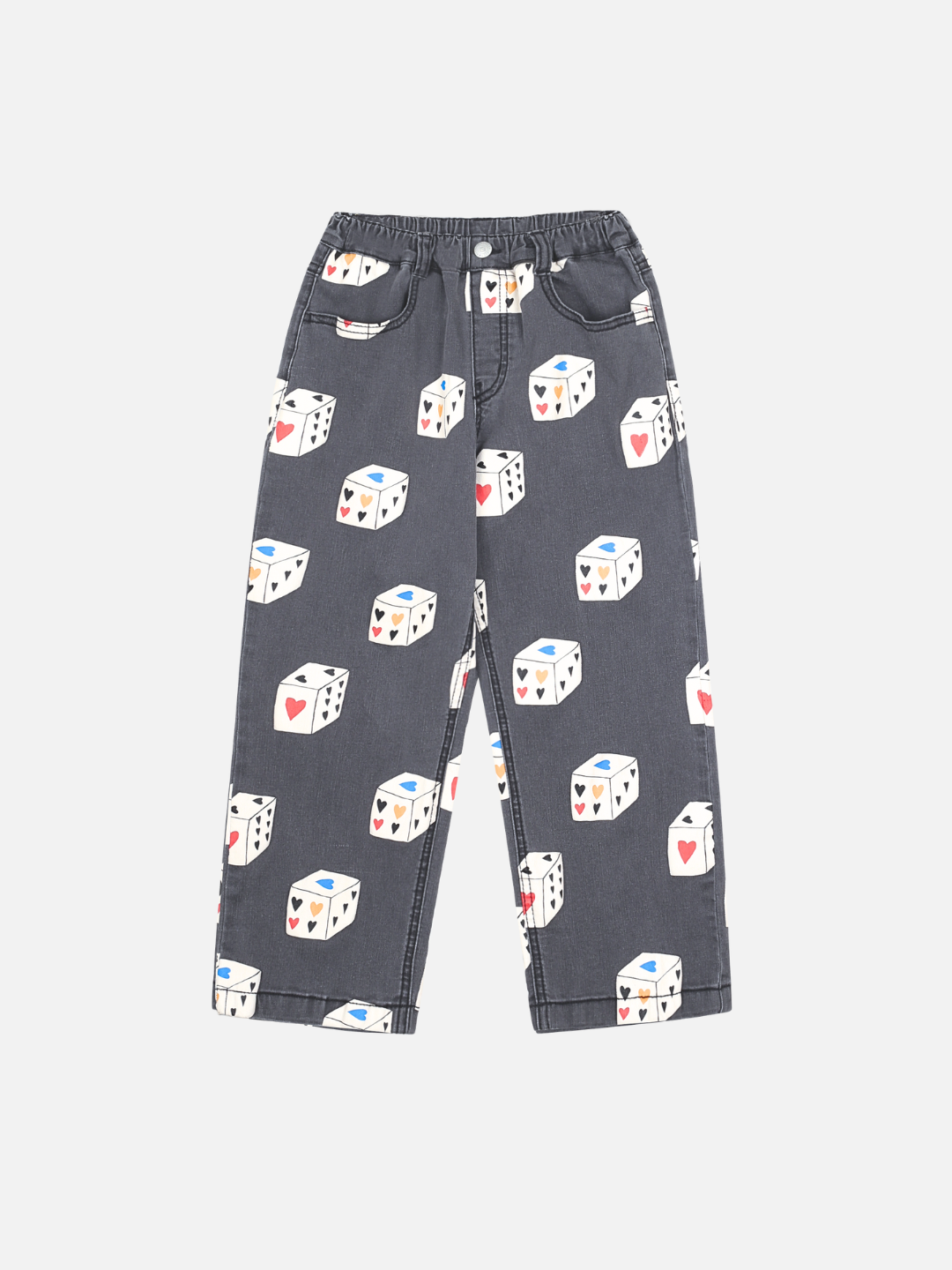 HEART DICE DENIM PANTS: Black wide-leg pants with an all-over print of white dice featuring red hearts, blue spades, and card suit symbols.