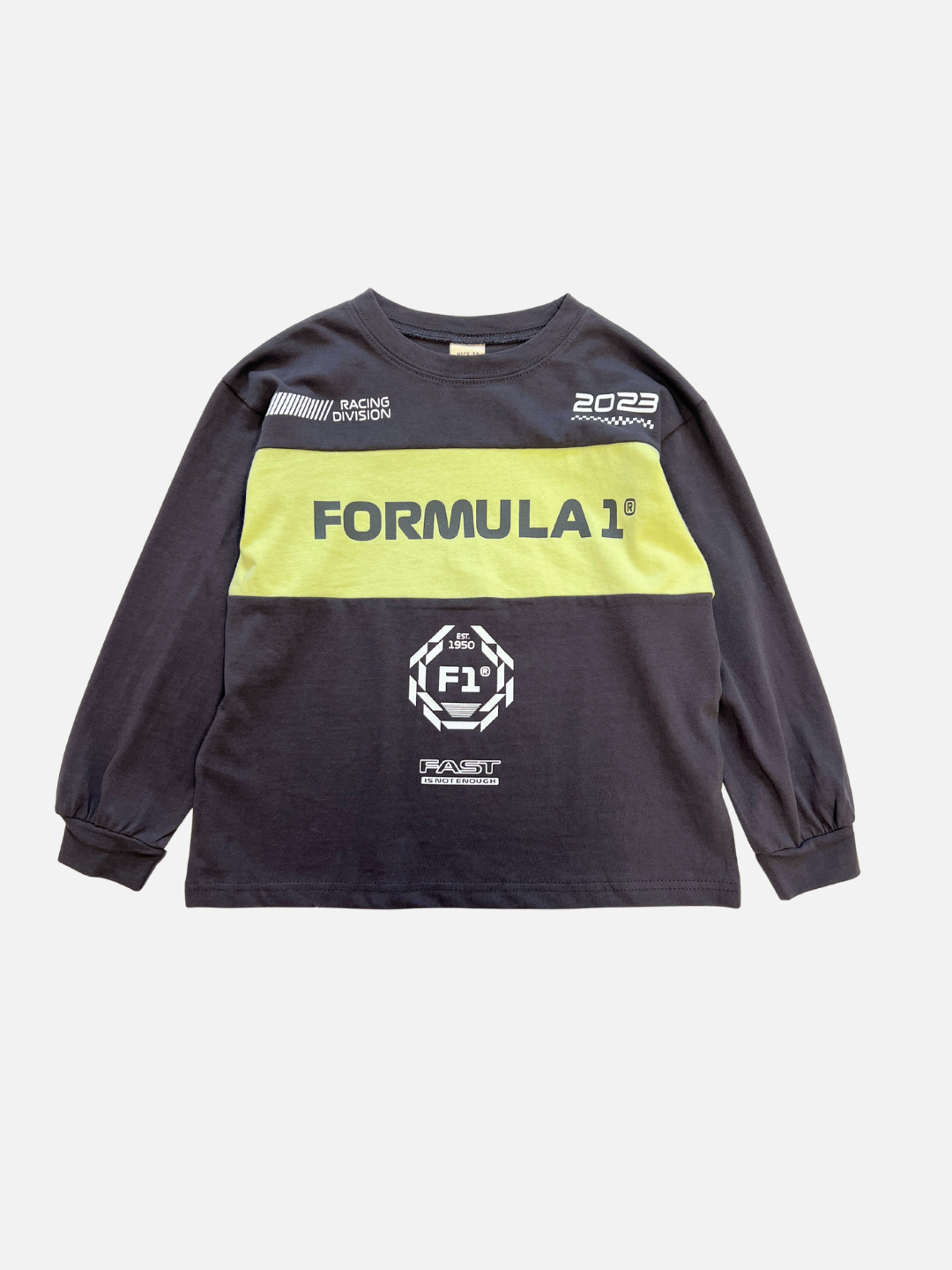 The RACING LONGSLEEVE is a black kids’ crewneck tee with long sleeves, yellow chest stripe, white “FORMULA 1” text, and racing graphics. Made from soft cotton jersey by a top Korean kids' brand.