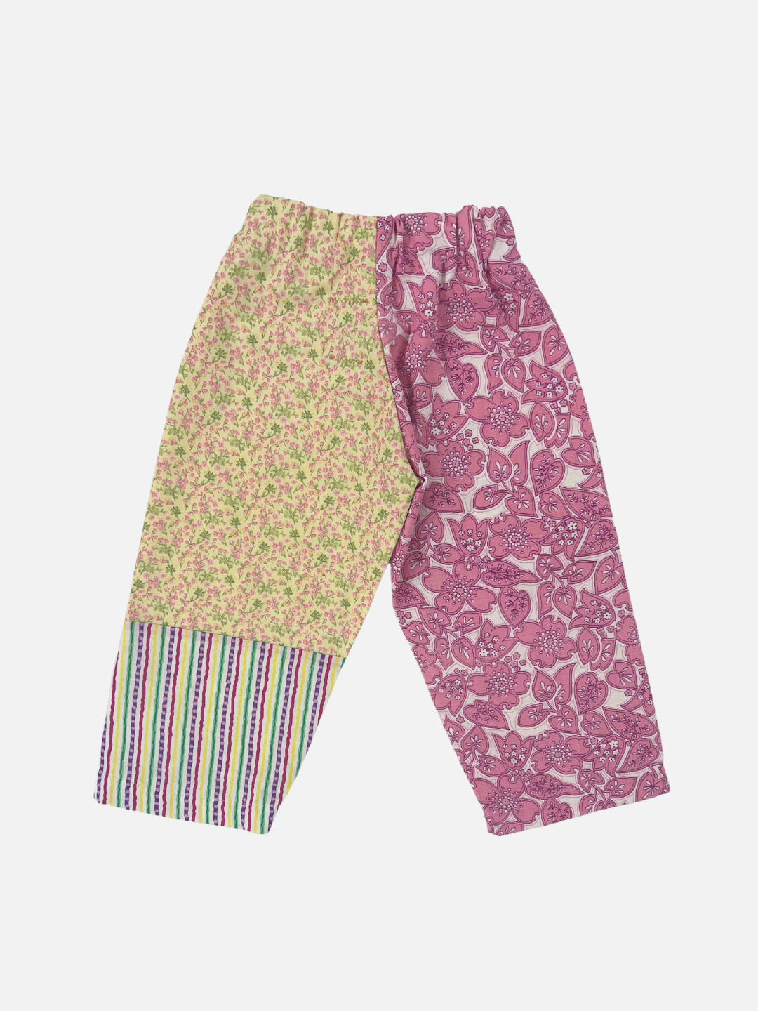 Back view of kid's patchwork pant. Left leg - pink flowers. Right leg - yellow flowers & stripes.