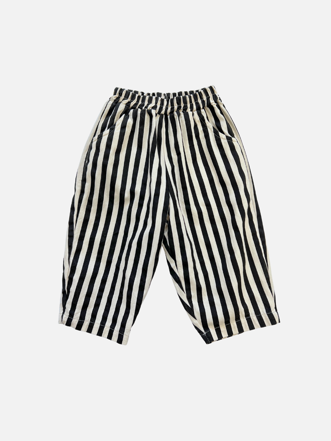 Black/Ecru | LICORICE STRIPE PANT in Black/Ecru features vertical stripes, barrel-leg cut, elastic waistband, and wide legs, shown laid flat on a white background.