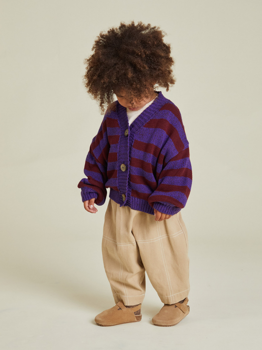 Second image of The EBEN PURPLE STRIPE CARDIGAN is a children's V-neck cardigan with purple and maroon horizontal stripes, long sleeves, and three large front buttons. Shipping costs may apply.