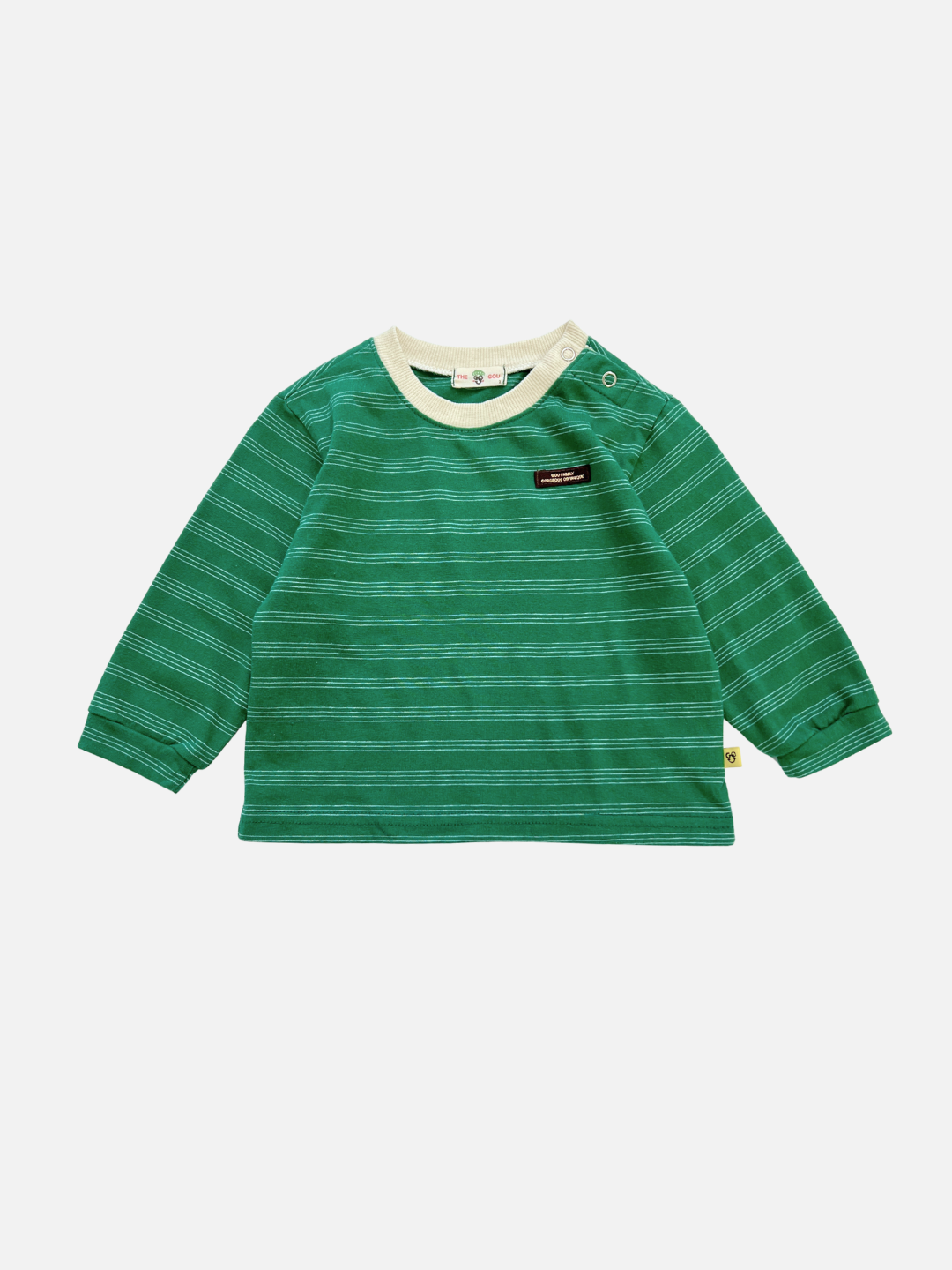 The MINI STRIPE LONGSLEEVE is a green baby tee with a white collar and chest label, made from soft cotton. Laid flat on a white background, this stylish piece is inspired by Korean baby clothing.