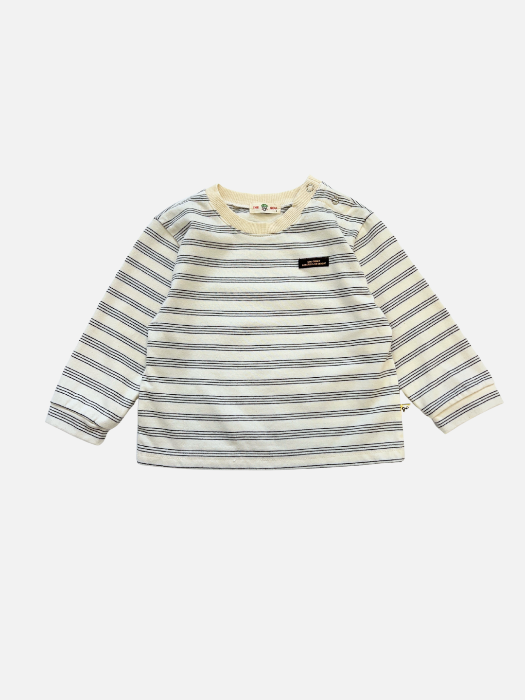 The MINI STRIPE LONGSLEEVE in ivory features thin blue and gray stripes, a cotton crew neck, long sleeves, and a small black chest label.