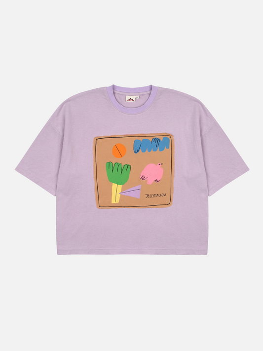 Image of Front of Frame T-Shirt. Brown rectangle with colorful shapes within its borders against a light purple background.