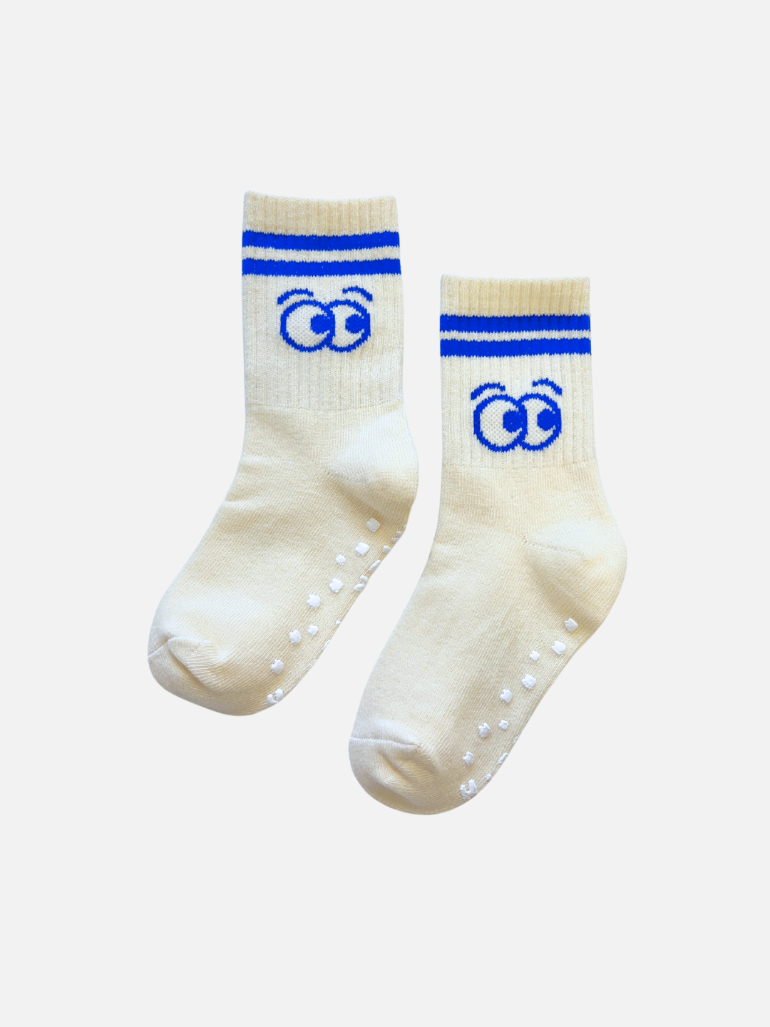 Eyeballs | A pair of RIBBED GRIP SOCKS in the Eyeballs color, featuring blue stripes, a double "C" logo near the top, plush cotton material, and white grip dots on the soles, shown against a white background.