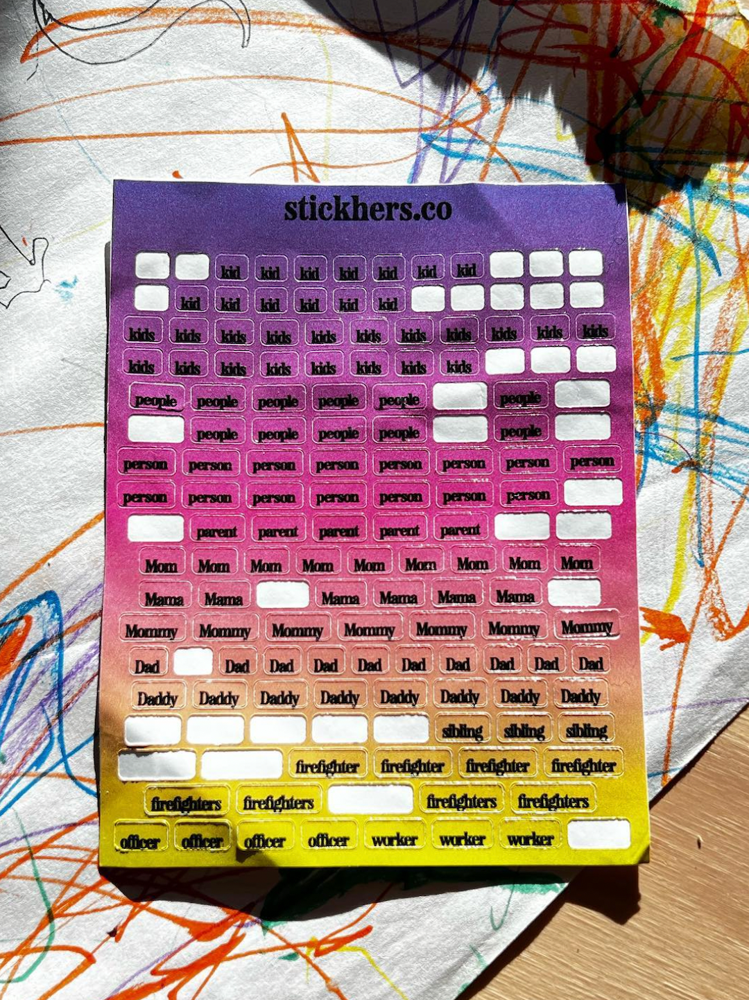 A vibrant sticker sheet from StickHERS features labels such as "kid," "person," "parent," and more, promoting gender equity with a colorful background adorned with dynamic scribbles.