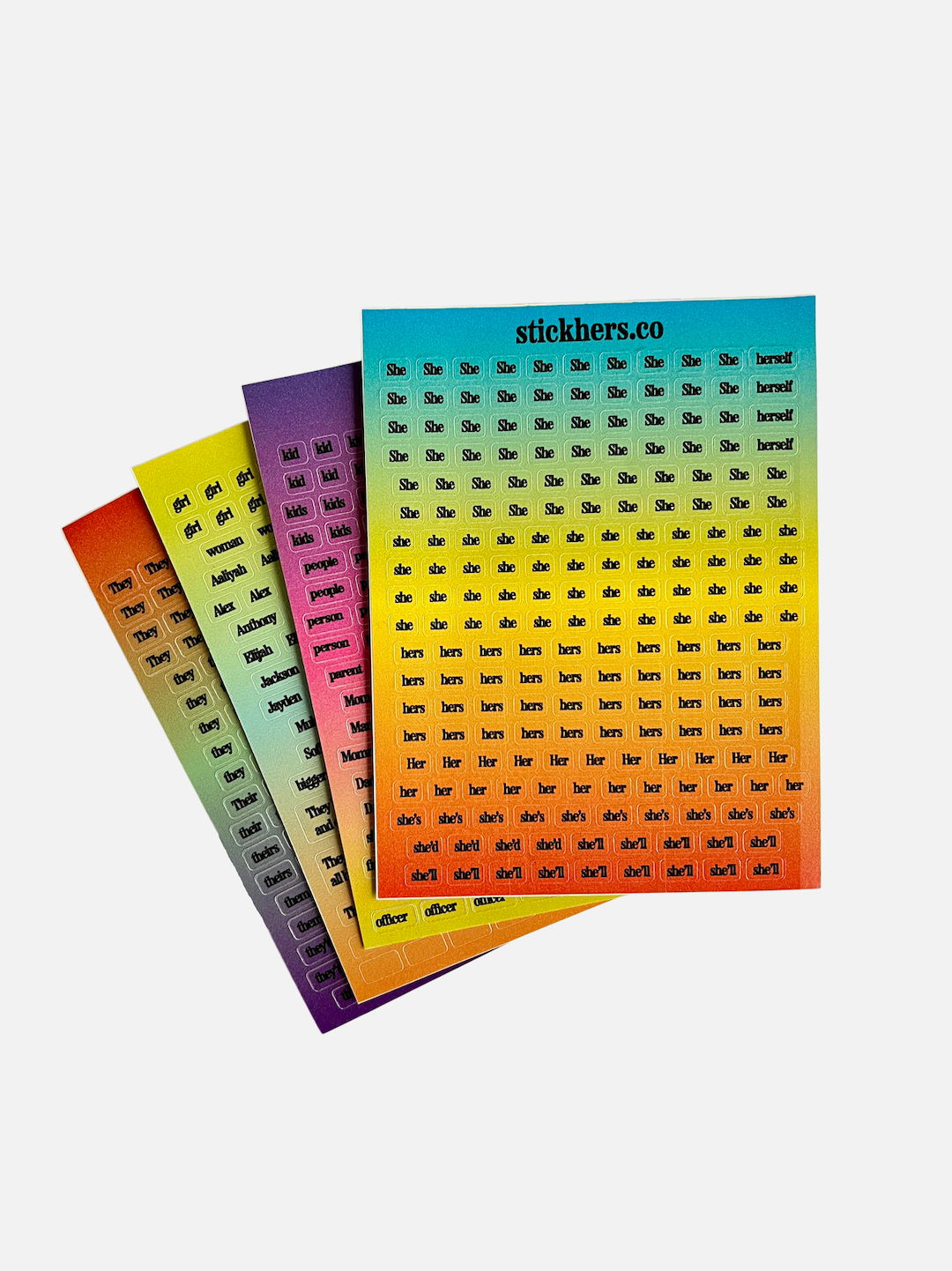 An image displays four vibrant sheets of StickHERS gender equity stickers, each featuring various pronouns. The stickers on the foremost sheet are labeled with pronouns such as "She," "Her," and "Hers," neatly arranged in rows against a gradient backdrop. This lively collection also includes non-gendered pronouns.