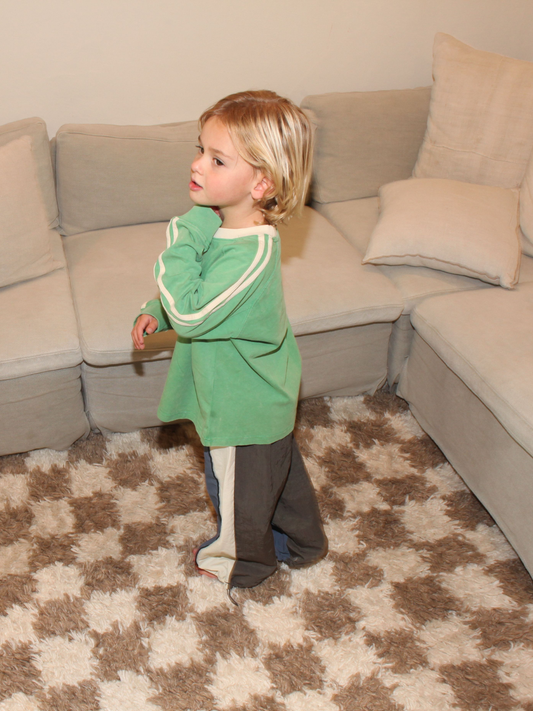 Second image of Green | The HALFTIME LONGSLEEVE is a green long-sleeved tee with off-white collar and sleeve stripes, offering a vintage feel and shown laid flat on a white background.