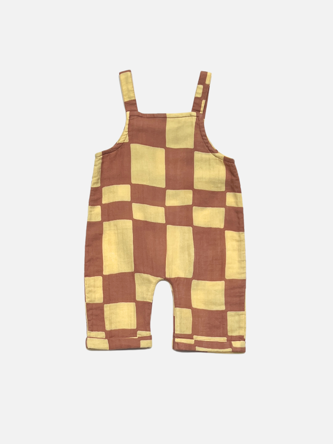 Yellow Checkers | MUSLIN OVERALLS: Toddler-sized romper with shoulder straps, made from organic cotton muslin, featuring a brown and yellow checkered pattern, displayed flat on a white background.