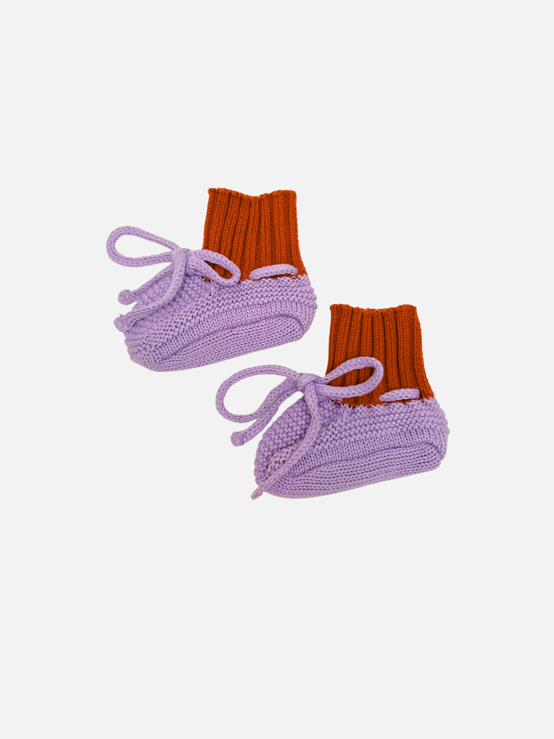 Knitted baby bootie in lavender purple with a red ribbed cuff and a purple tie closure