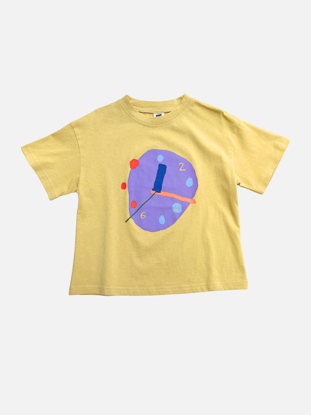 The CLOCK TEE in yellow is made from 100% cotton and features a graphic of a distorted purple clock with colorful dots and abstract hands on the front.