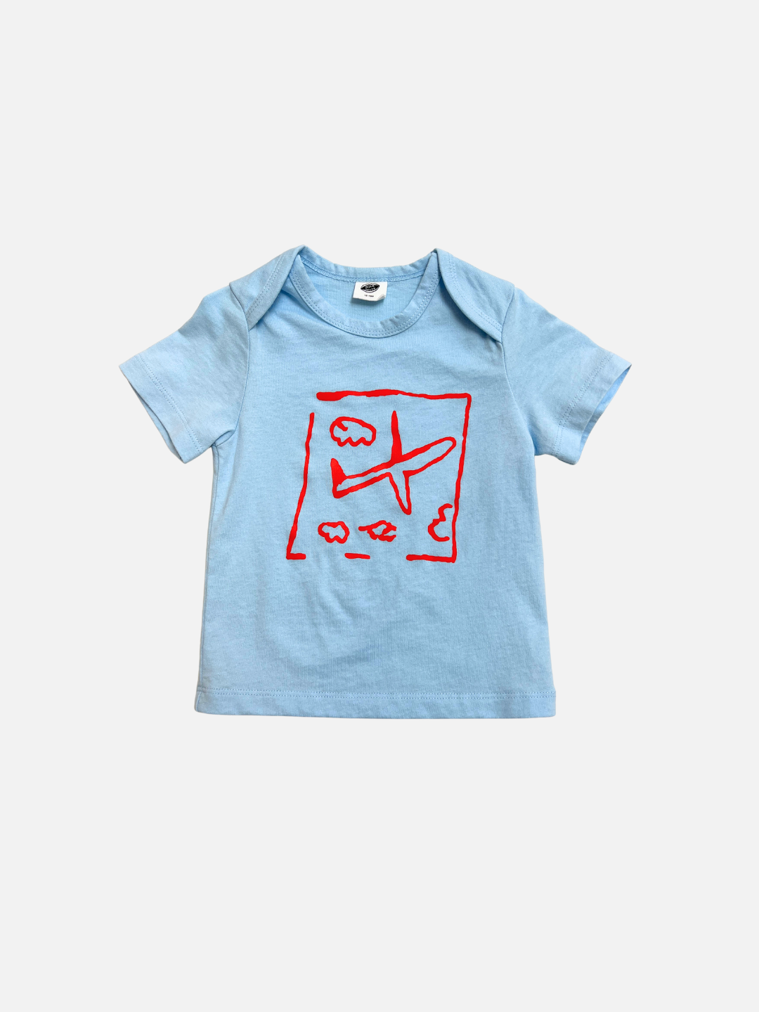 Light Blue | The AIRPLANE BABY TEE is a light blue short-sleeve toddler shirt with a playful red abstract airplane and cloud print on the front, shown against a plain white background.