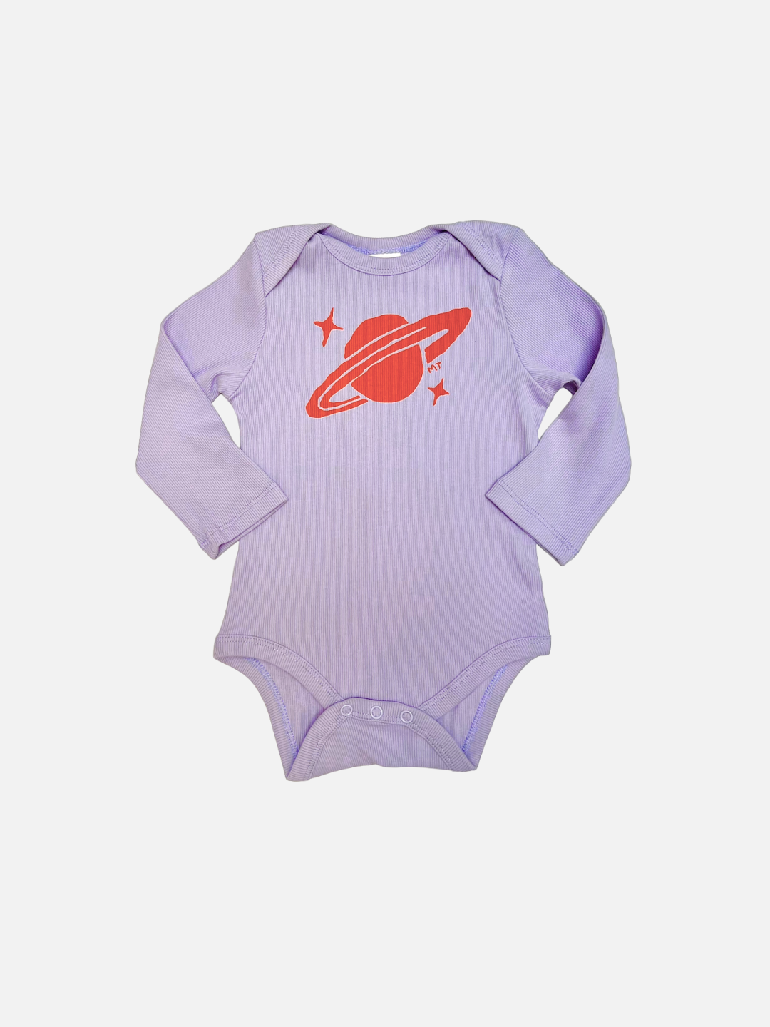 The SATURN LONG SLEEVE ONESIE is a lavender ribbed cotton baby bodysuit featuring a red planet and stars graphic on the chest, designed for easy diaper changes. Shown on a plain white background.