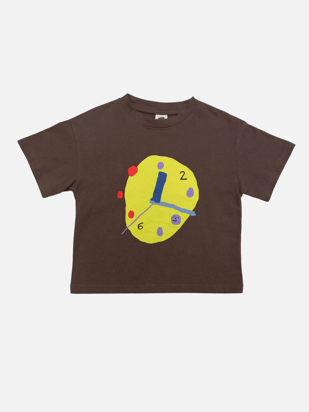 A dark brown short-sleeve kids' t-shirt featuring a graphic of a clock face made from a yellow paint splatter with blue hands and colorful dots.