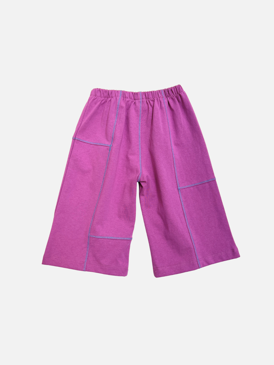 Magenta | The TOPSTITCH BABY PANT features purple wide-leg pants with an elastic waist and visible blue stitching, designed as sturdy crawling pants, shown on a plain white background.