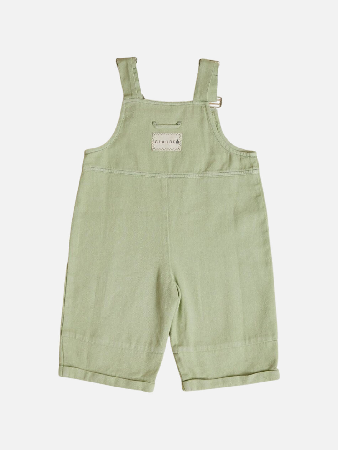 The BLYTHE MINT DUNGAREE features light green toddler overalls with adjustable shoulder straps, a front chest pocket, and a "CLAUDIA&" label on the chest.