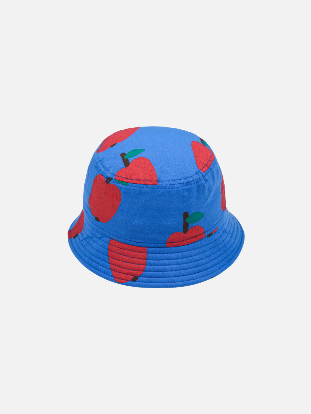 The APPLE BUCKET HAT is blue and adorned with a pattern of red apples and green leaves.