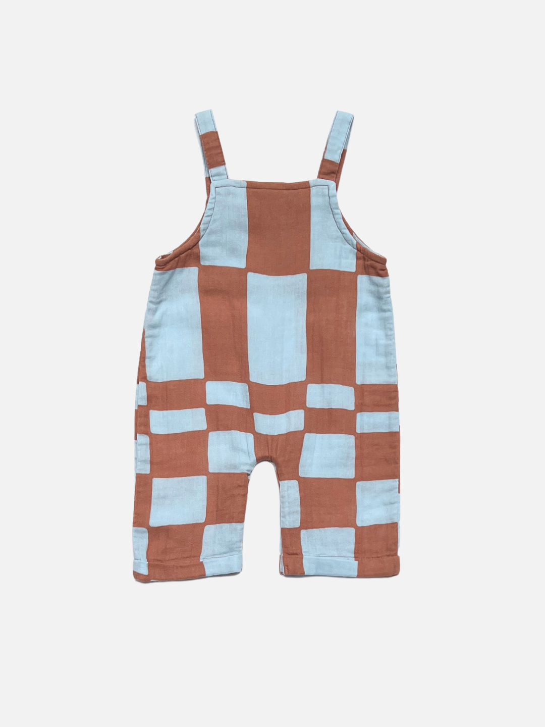 MUSLIN OVERALLS with shoulder straps, featuring a brown and light blue checkerboard pattern, crafted from soft organic cotton, displayed flat on a white background.