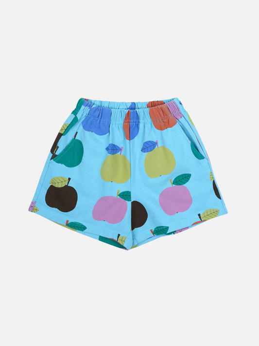 Image of Front of Colorful Apple Shorts. Multi-colored apple print on a light blue background with an elastic waist.