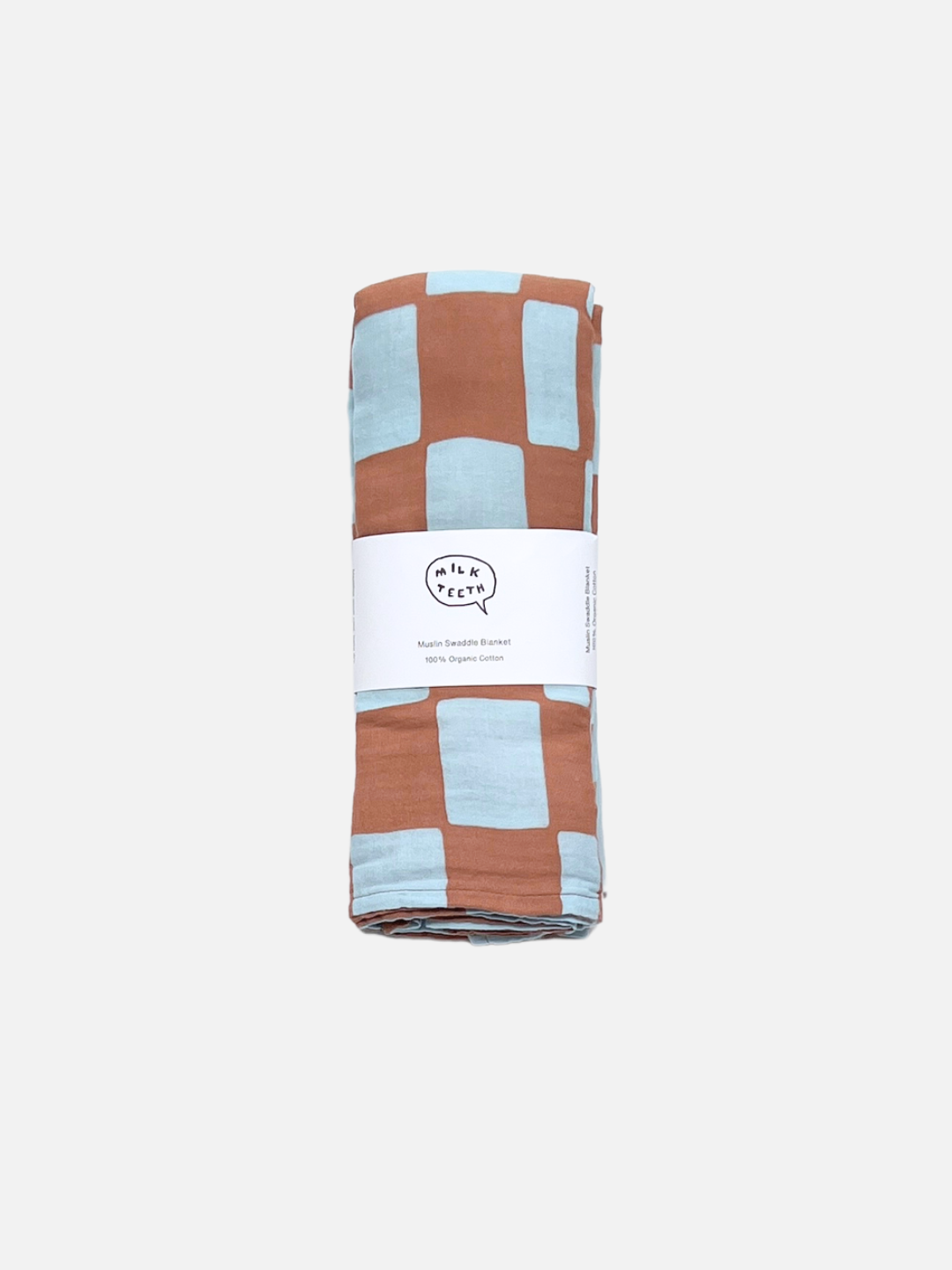 A MUSLIN SWADDLE BLANKET in a blue checkers print, made of 100% organic cotton, folded and wrapped with a white label that says “Mush Swaddle Blanket.”.