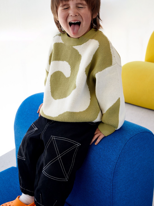 Second image of Sage | Front view of kids crewneck sweater in sage green, with a large single cream swirl design that covers the entire sweater.