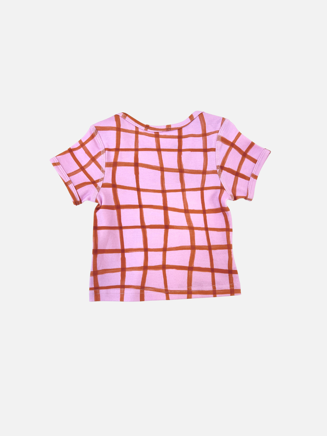 Discover the PAINTBRUSH CHECK LAP-SHOULDER TEE, a stylish pink short-sleeve T-shirt featuring a striking red grid on a plain white background. Offering both comfort and visual appeal, it's perfect for those who appreciate quality fashion.