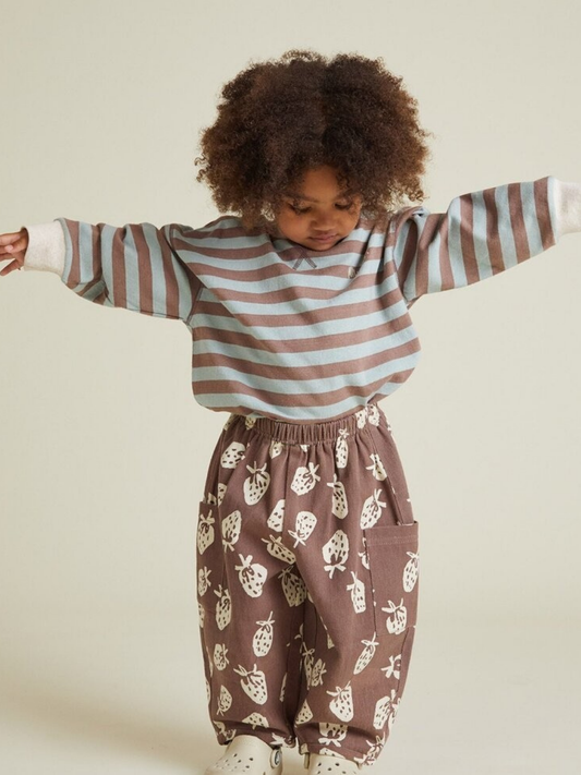 Second image of The RUE CHOC STRIPE LONG SLEEVE TEE is a children's top featuring brown and light blue horizontal stripes, white cuffs and collar, plus small text on the left chest.