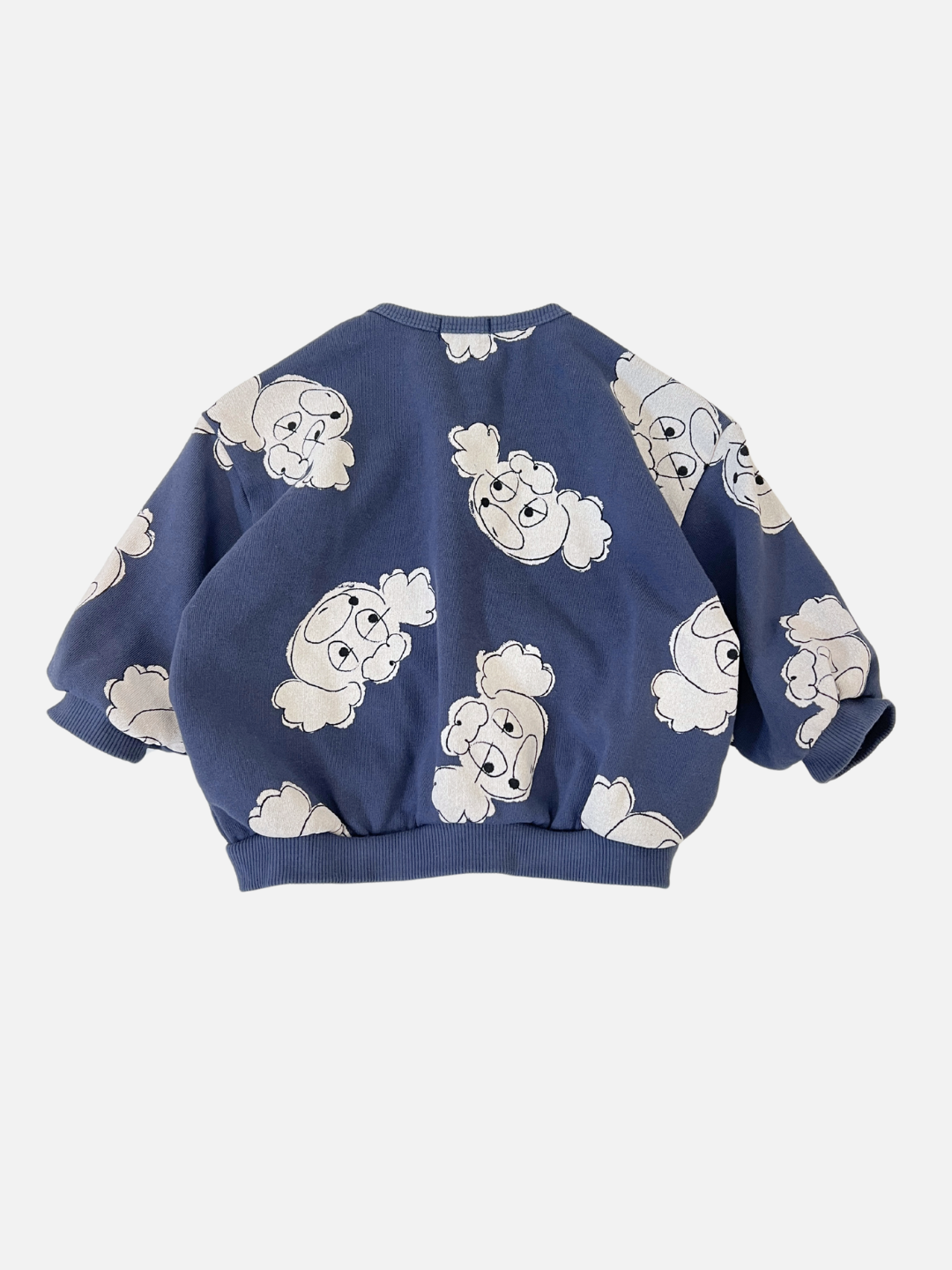 Navy | POODLE BUTTON DOWN SWEATSHIRT in blue with white cartoon dog faces pattern, made from soft French terry, showcased from the back on a plain white background.