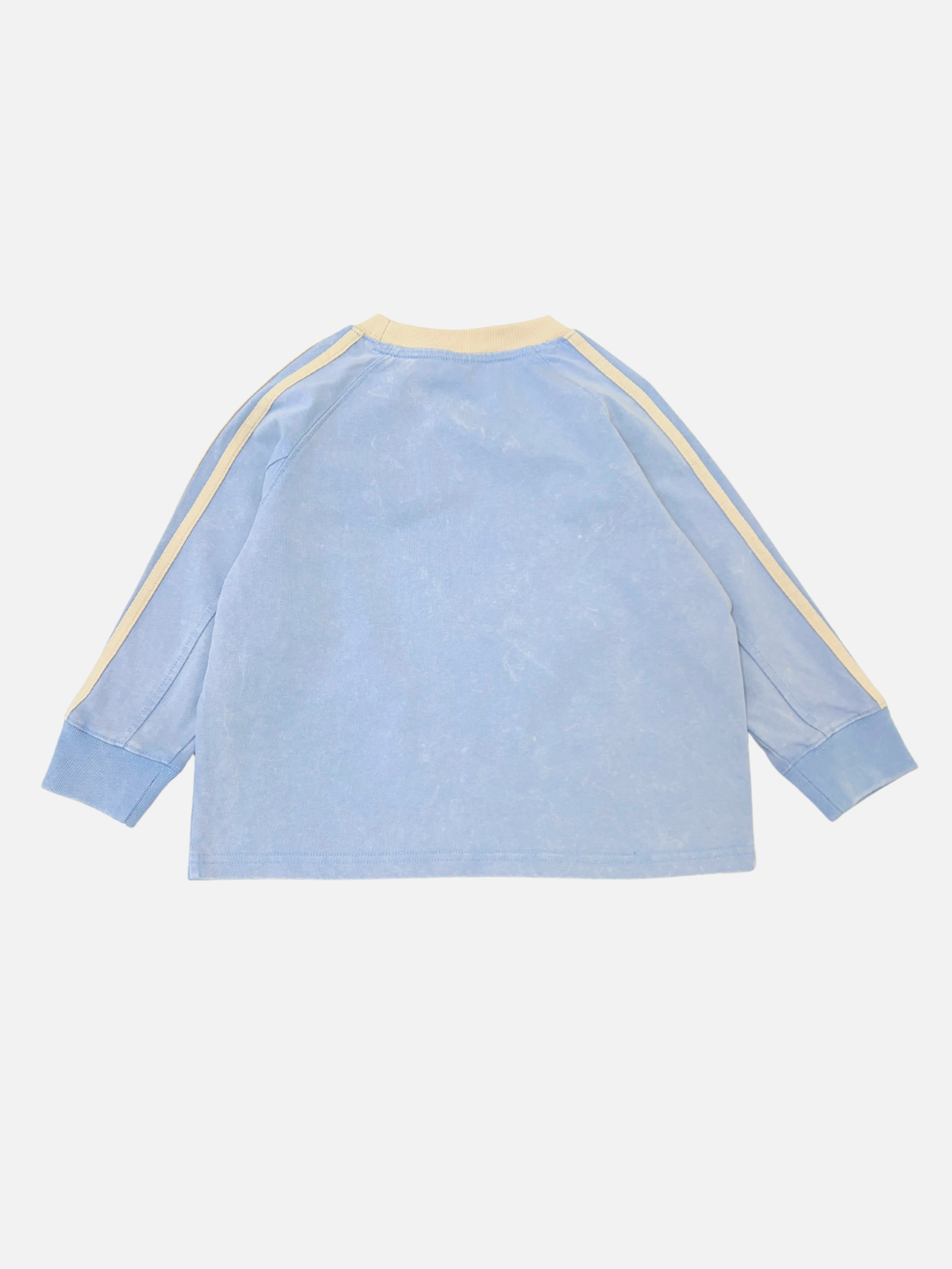 The HALFTIME LONGSLEEVE is a light blue, oversized long-sleeve tee with a beige collar and striped sleeves, shown flat with the back facing up.