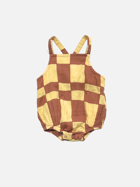 Image of Yellow Checkers | Checkered romper with brown and yellow pattern on a white background