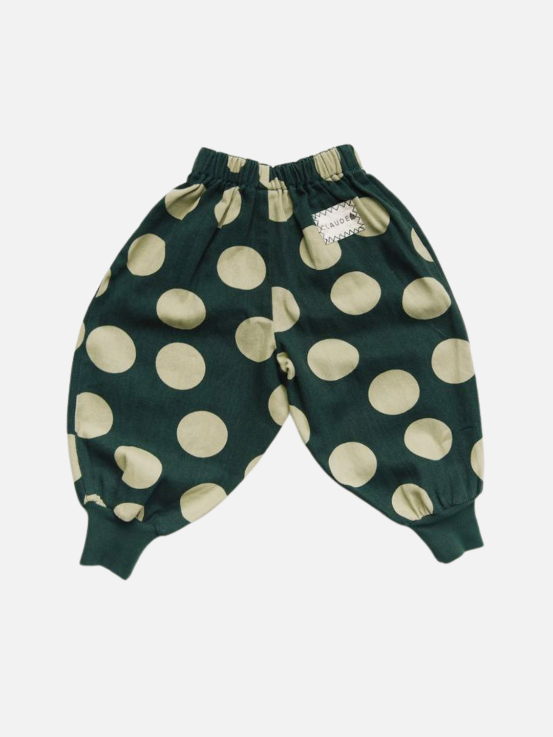 EMERSON KALE POLKA TROUSER: Children’s green pants with large beige polka dots, elastic waistband, and cuffs shown on a white background.