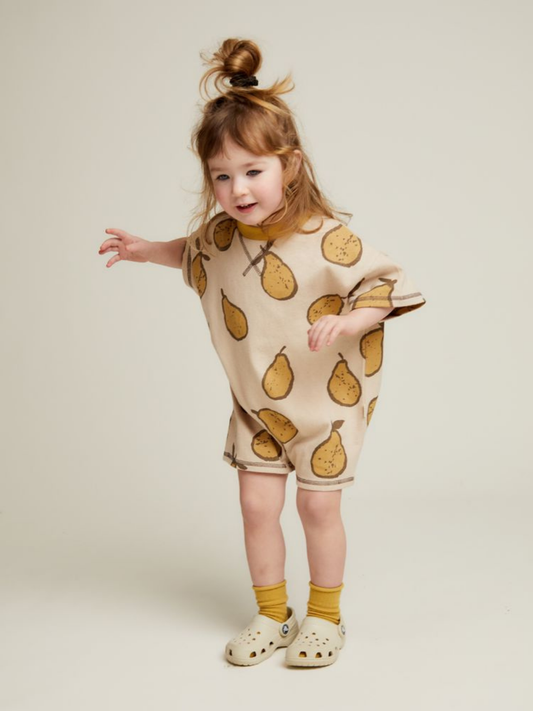 Second image of The OPAL ALMOND PEAR ROMPER is a short-sleeved baby romper featuring a yellow collar and a brown pear print on a beige background.