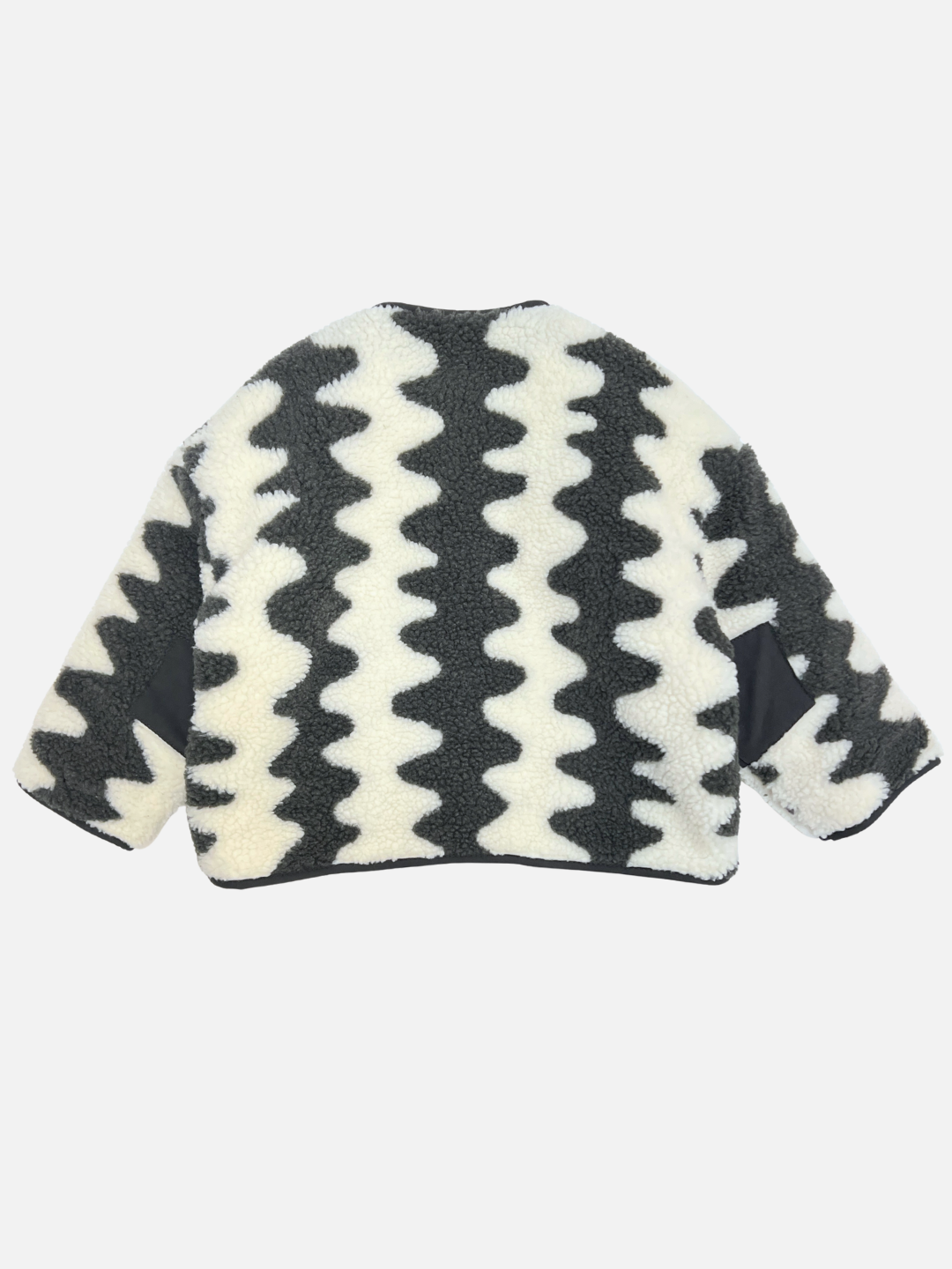Charcoal | The WAVELENGTH SHERPA JACKET features a black and white wavy zigzag pattern, displayed from the back against a plain background.