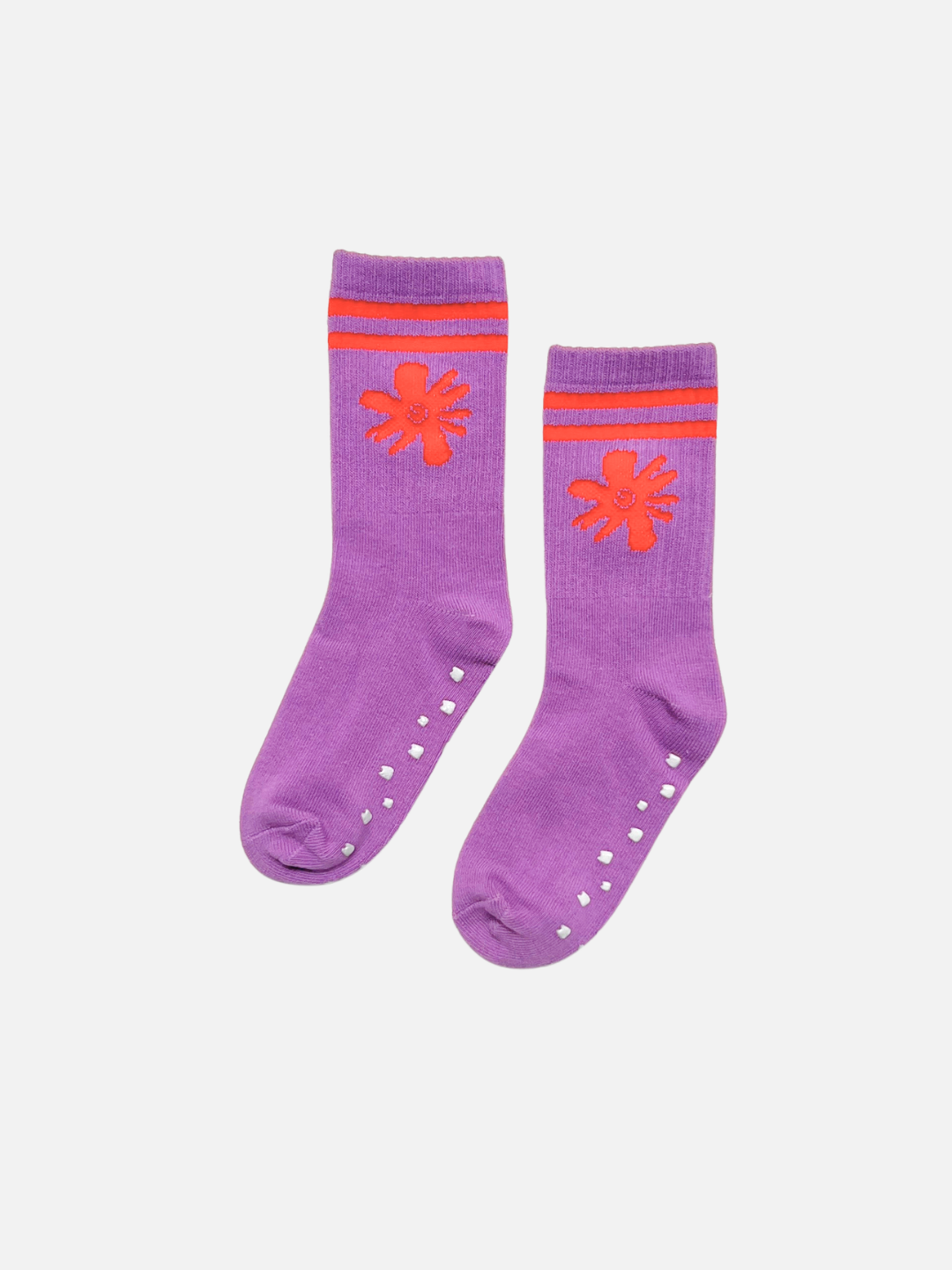 Swirl Flower | Purple socks with orange flower designs and striped patterns on a white background