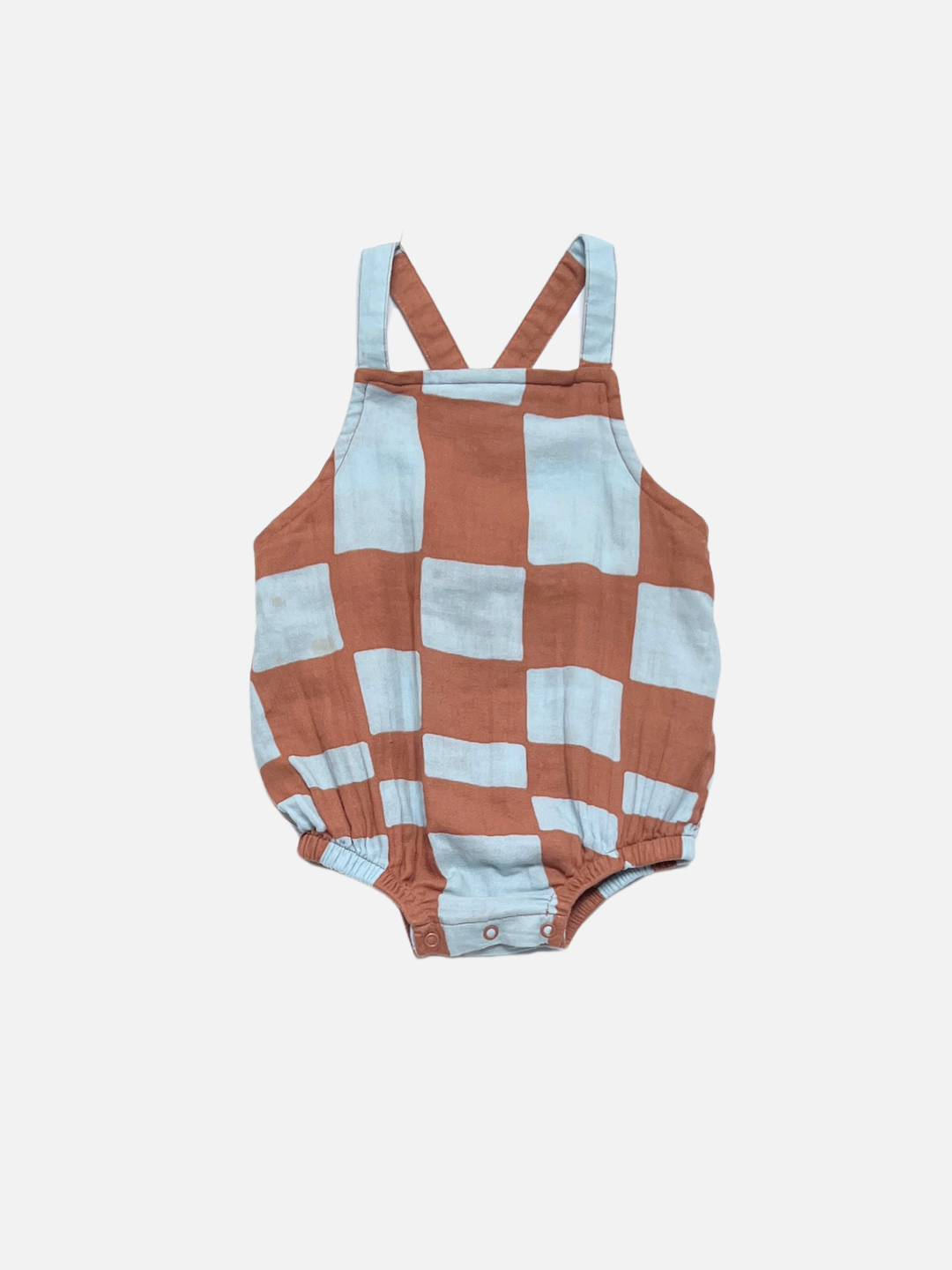 Blue and brown checkered baby romper with suspenders on a light gray background.