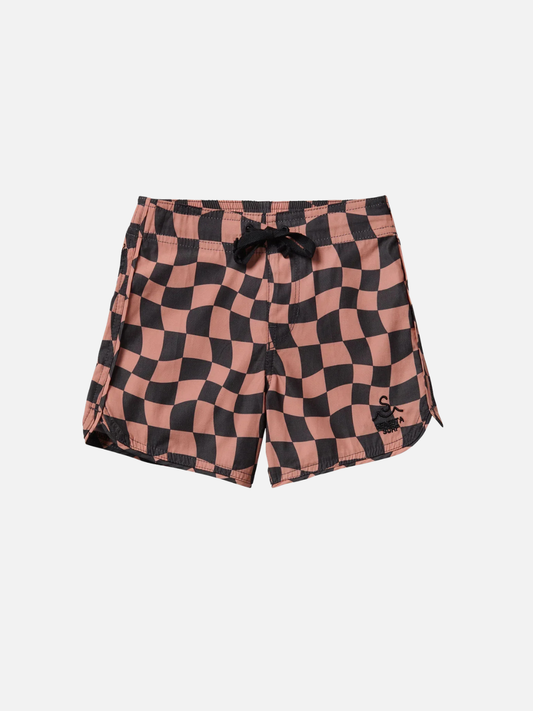 Image of The WAVY CHECKS RETRO FLARE BOARDSHORTS feature a pink and black wavy checkerboard pattern, scalloped hem, black drawstring, and a small left-leg logo, shown on a white background.
