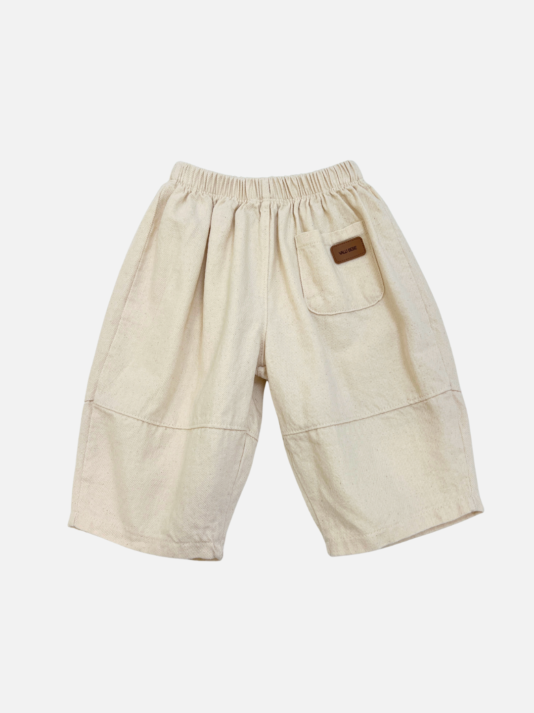 Ecru | Ecru BABY BALLOON JEAN pants with a wide-leg silhouette, elastic waistband, and a single back pocket featuring a small brown label, displayed flat on a white background.