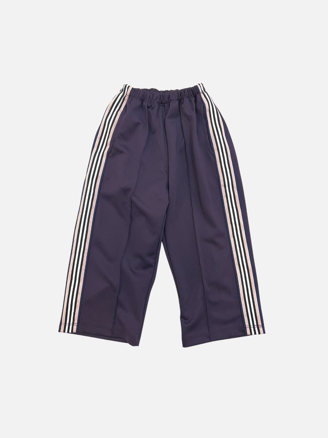 MASKING TAPE PANTS in purple, featuring crisp white vertical side stripes, an elastic waistband for comfort, and wide legs. Displayed laid flat on a white background.